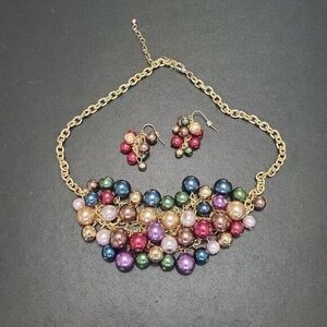 Gold tone matching beaded necklace and earring set